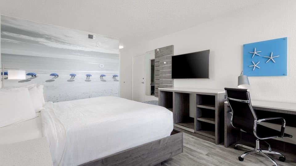 Unwind into crisp linens after a sun-soaked beach day.