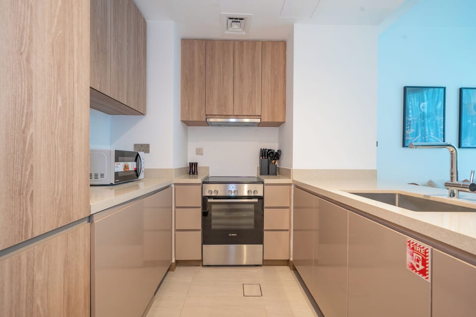 Apartment, Balcony, City View | Private kitchen | Espresso maker, electric kettle