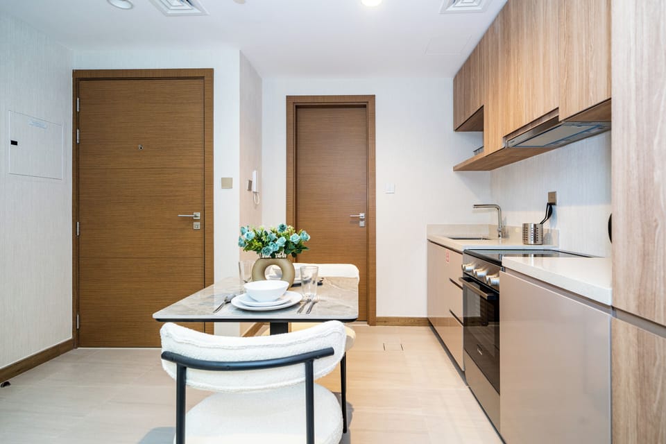 Apartment, Balcony, Lake View | In-room dining