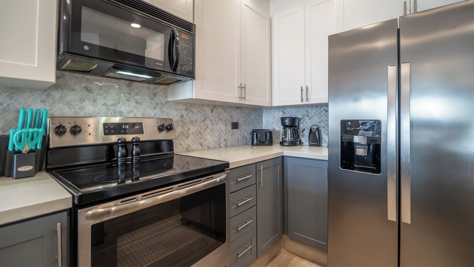 Stylish backsplash and appliances in the kitchen