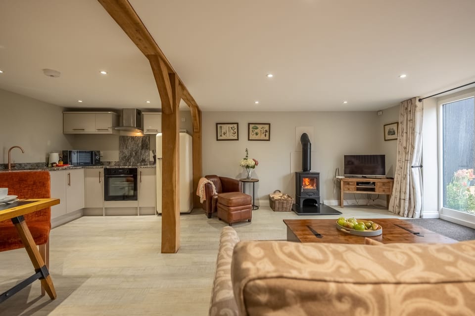 Ground floor: Open plan living space with wood burning stove