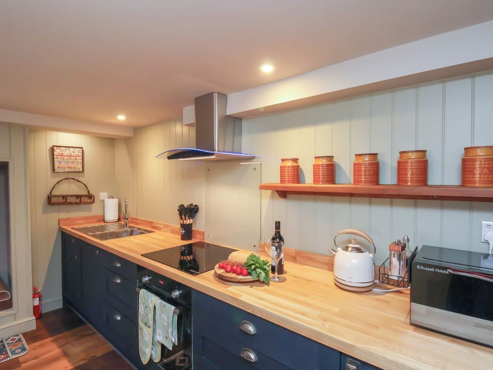 Fridge, microwave, cookware/dishes/utensils