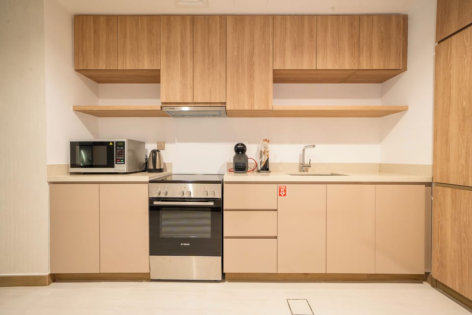 Apartment, Balcony, Lake View | Private kitchen | Espresso maker, electric kettle