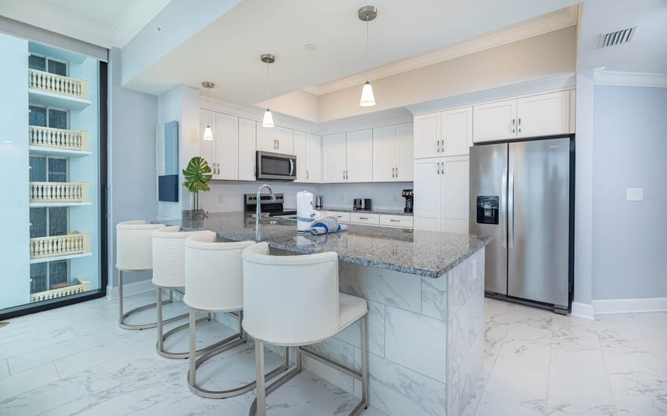 Condo, 4 Bedrooms | Private kitchen | Coffee/tea maker, fridge, oven
