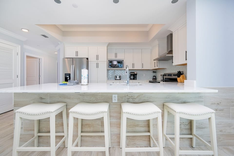 Condo, 4 Bedrooms | Private kitchen | Coffee/tea maker, fridge, oven