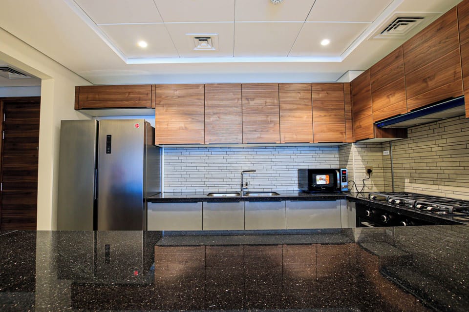 Apartment, Balcony, City View | Private kitchen | Espresso maker, electric kettle