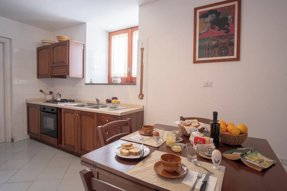 Comfort Apartment, Kitchen, Sea View | Private kitchen | Full-size fridge