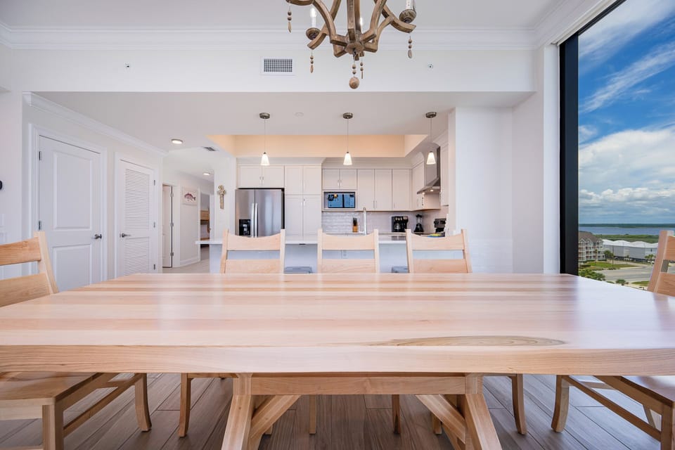 Enjoy family meals or a fun game night with panoramic beachfront views