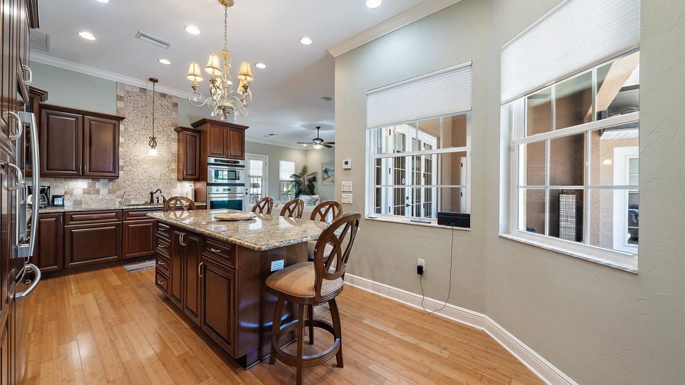 Large kitchen island with plenty of seating for meals and gatherings