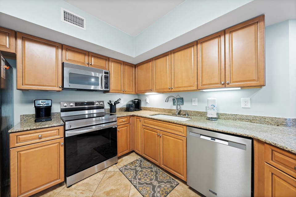 Signature Condo, 3 Bedrooms, Balcony, Pool View | Private kitchen | Stovetop, coffee/tea maker, electric kettle, toaster