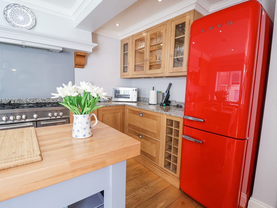 Fridge, microwave, toaster, cookware/dishes/utensils