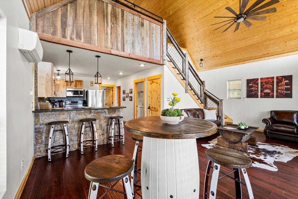 Grab a seat at the whiskey barrel table or pull up to the kitchen bar—meals taste better with good company