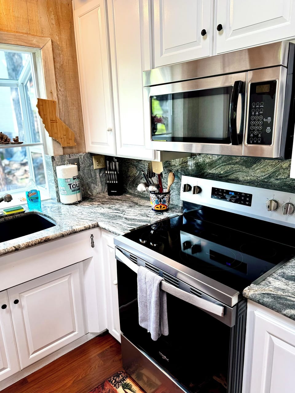 Modern appliances, granite-style counters, and everything you need to cook.