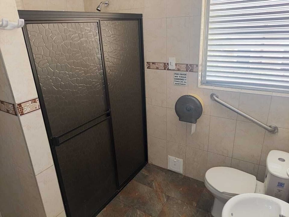 Comfort Room | Bathroom | Shower, towels, soap, toilet paper