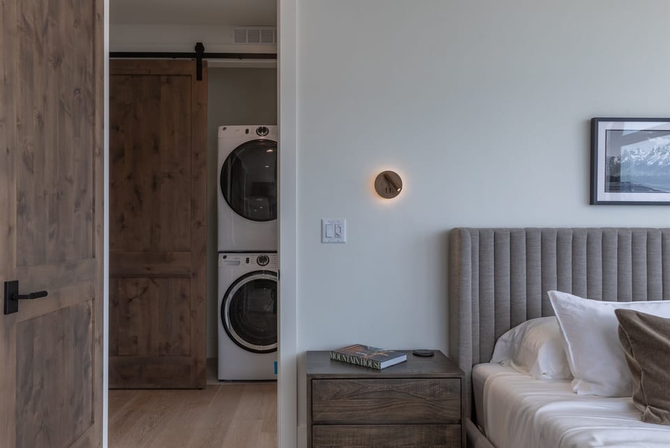 A washer and dryer are available accross from suite one