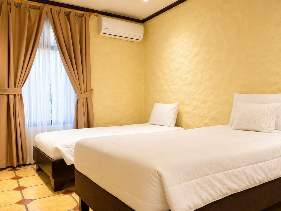 Standard Triple Room | Iron/ironing board, free WiFi, bed sheets