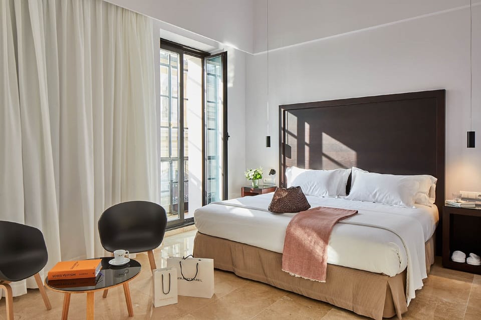 Hypo-allergenic bedding, down comforters, free minibar items