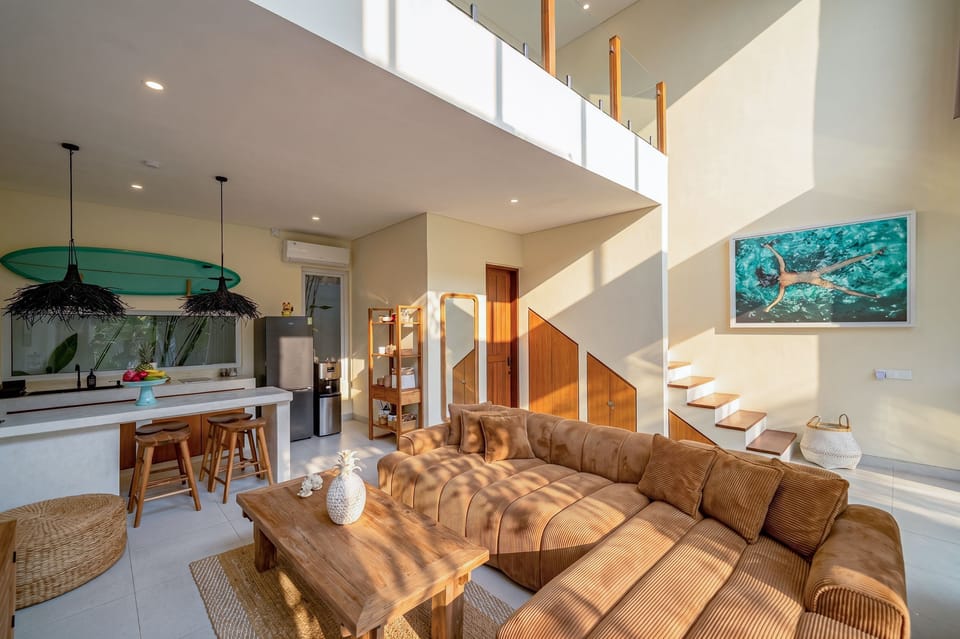 Deluxe Villa, 1 Bedroom, Patio, Pool View | Living area | 50-inch TV with cable channels