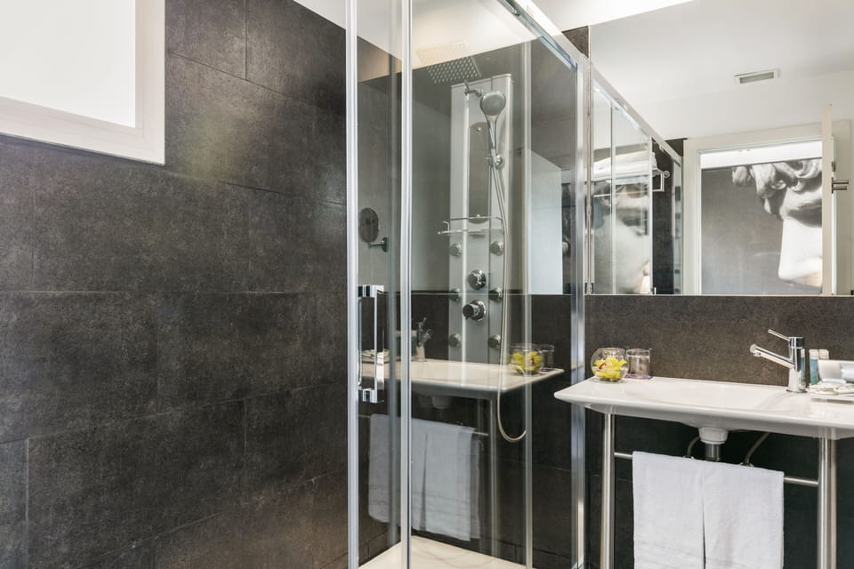 Shower, free toiletries, hair dryer, towels