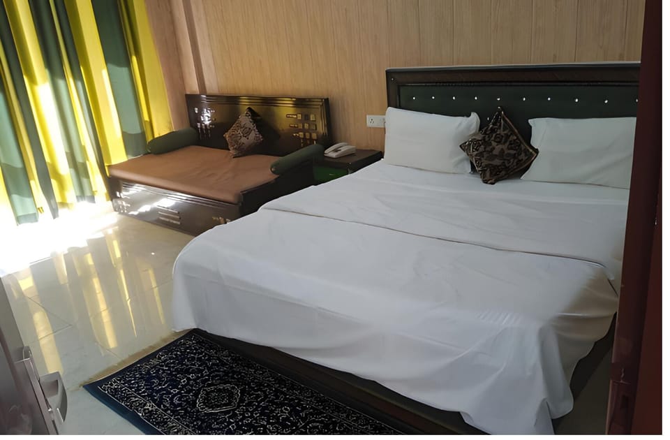 Deluxe Double Room | Down comforters, Select Comfort beds, desk, free WiFi