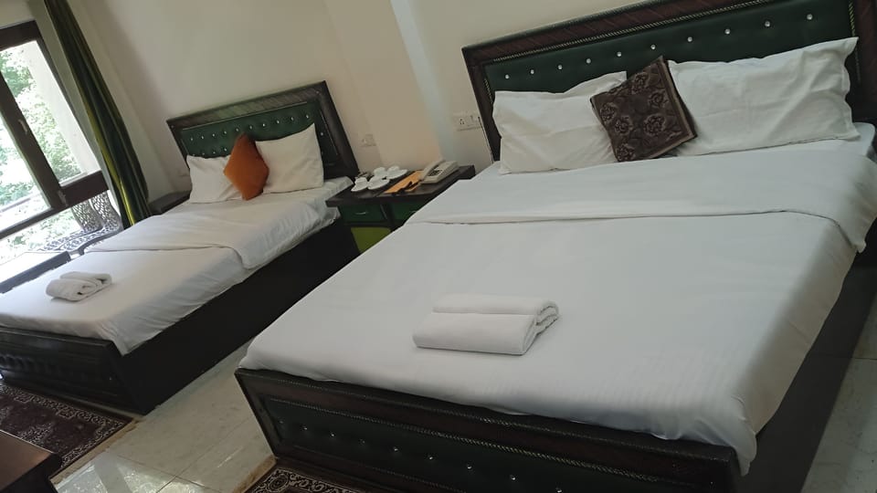 Family Room, Balcony, Lake View | Down comforters, Select Comfort beds, desk, free WiFi