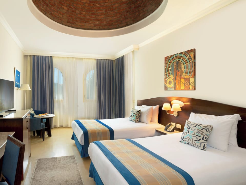 Family Room, 2 Bedrooms | In-room safe, blackout drapes, free cribs/infant beds, free WiFi