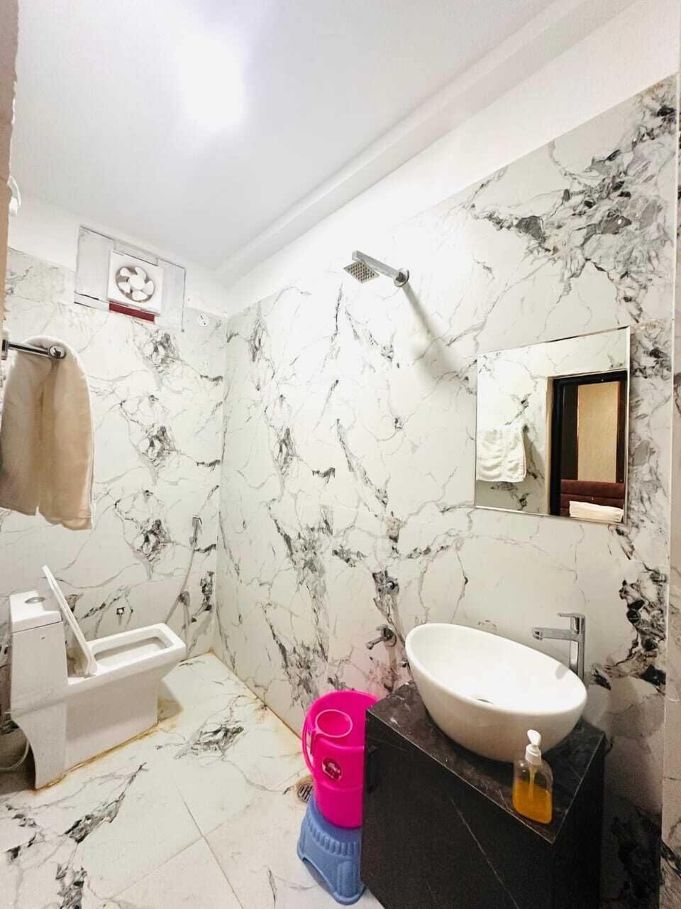 Shower, free toiletries, slippers, towels