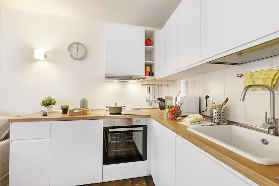 Standard Apartment, Multiple Bedrooms (Appartamento Rio Secco) | Private kitchen | Fridge, microwave, oven, stovetop