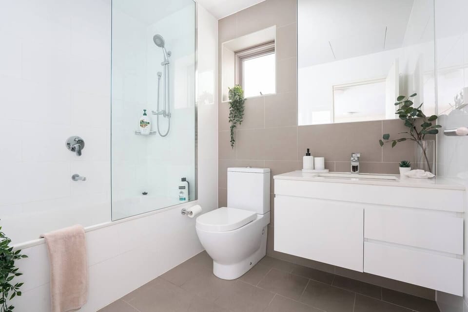 A modern bathroom comes with a combination bathtub and shower to help you feel refreshed and revitalised.