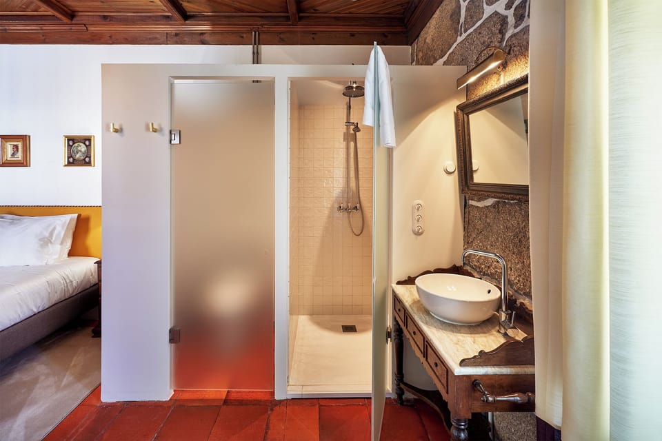 Comfort Suite | Bathroom | Hair dryer, bathrobes, slippers, towels