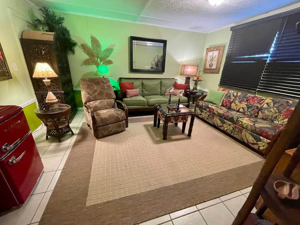 Signature Condo, 1 King Bed with Sofa bed, Non Smoking | Living room | 55-inch Smart TV with digital channels