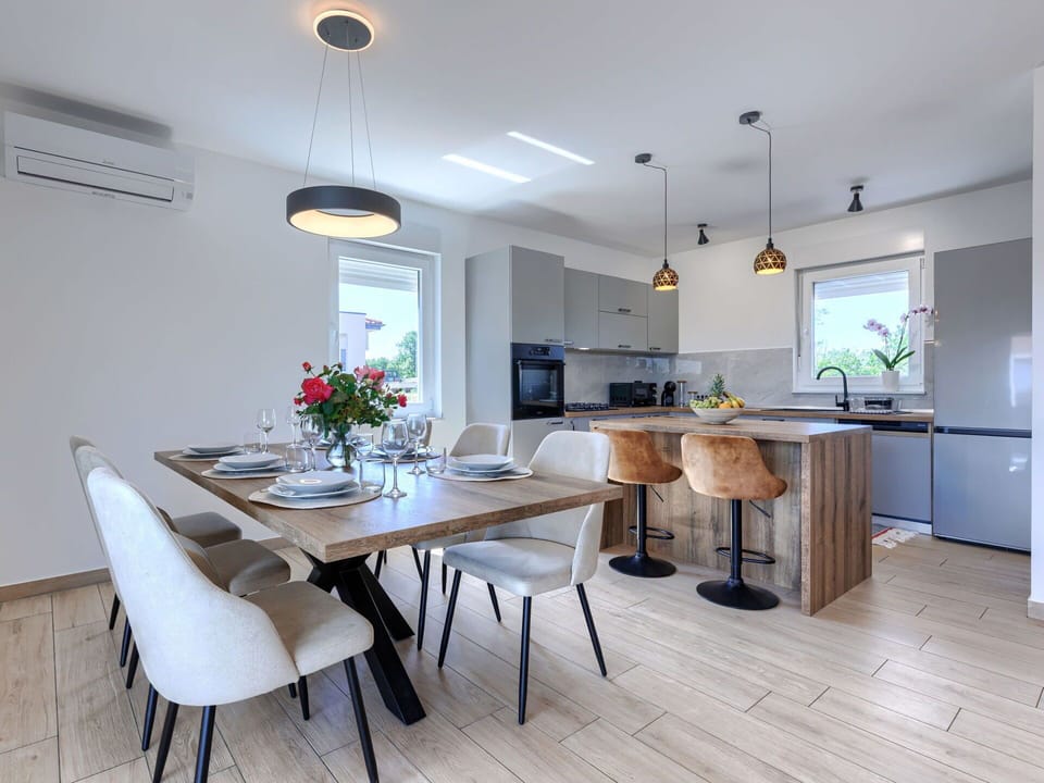 Furniture, Interior Design, Flooring, Light Fixture, Chair, Kitchen & Dining Room Table, Table, Dining Room, Wood, Floor