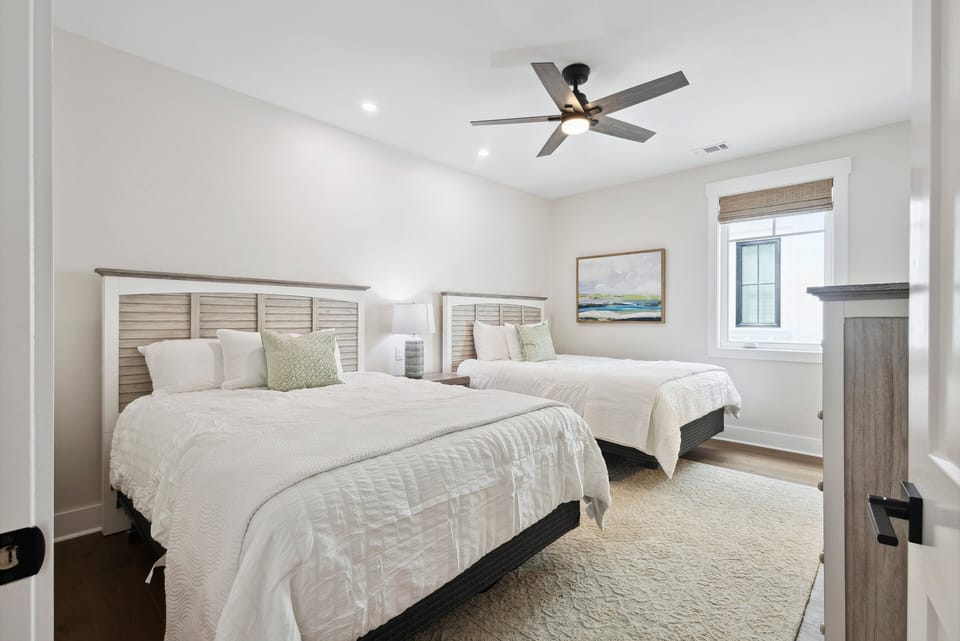 Bedroom 3 - Stylish room with 2 Queen Beds, a private En-suite Bathroom, and a walk-in shower