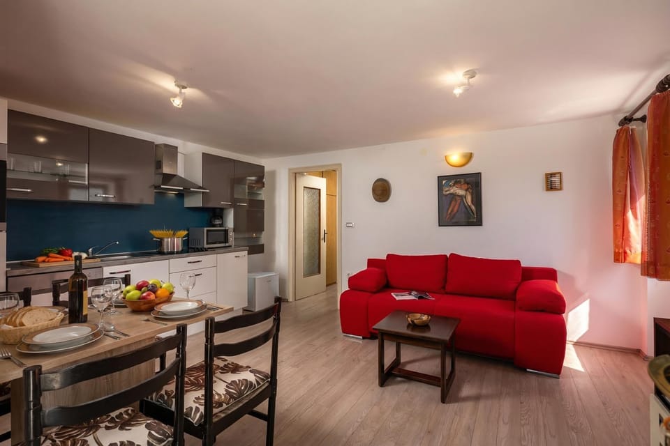 Family Apartment, 1 Bedroom, Microwave (The Wave - Apt with Seaview and) | Living area | Smart TV