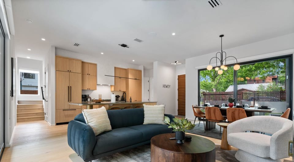 Meals, movies, and culinary magic—this open layout`s got all the ingredients for a perfect stay!