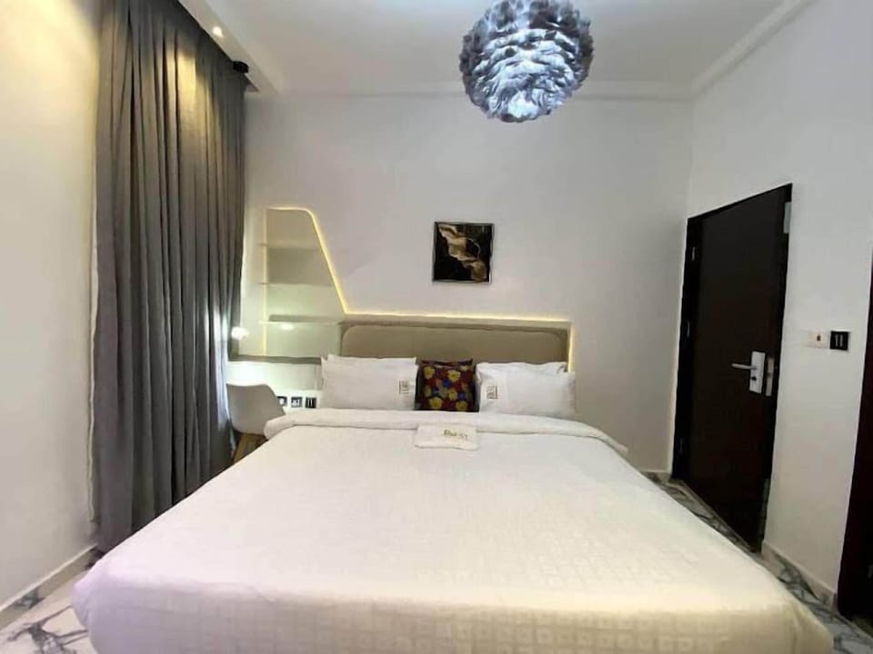 Economy Room, Balcony, City View | Desk, laptop workspace, blackout drapes, free WiFi