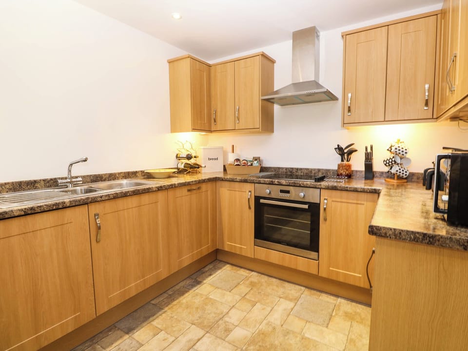 Fridge, microwave, toaster, cookware/dishes/utensils