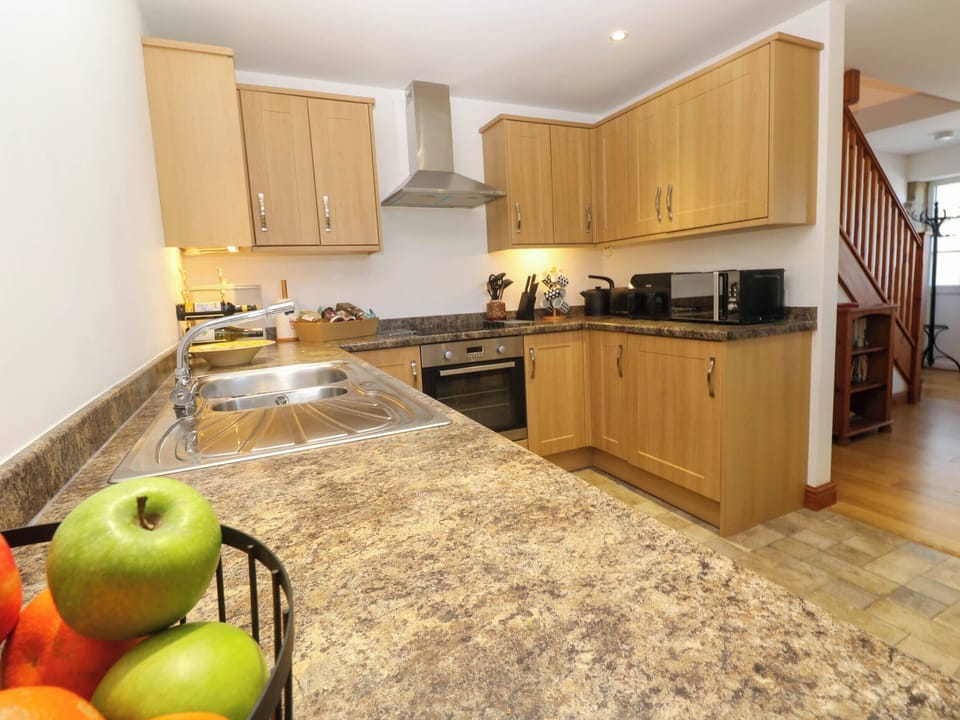 Fridge, microwave, toaster, cookware/dishes/utensils