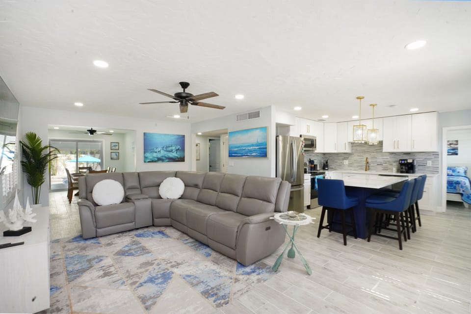 The open floor plan lets guests keep the cook company.