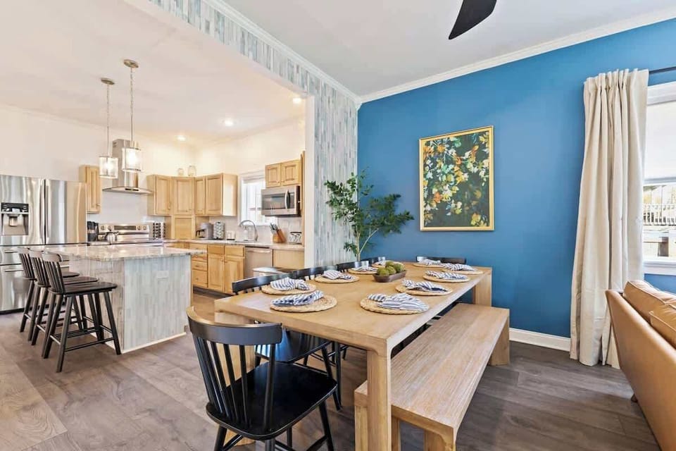 Where meals become memories — gather around the spacious dining table, cook up family favorites in the modern kitchen, and relax in a space designed for comfort, connection, and a touch of Naptown charm. Your perfect home away from home awaits!