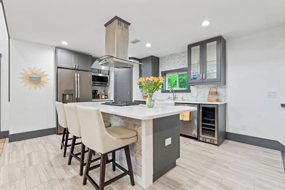 Cook in a chef’s kitchen with modern finishes perfect for group stays