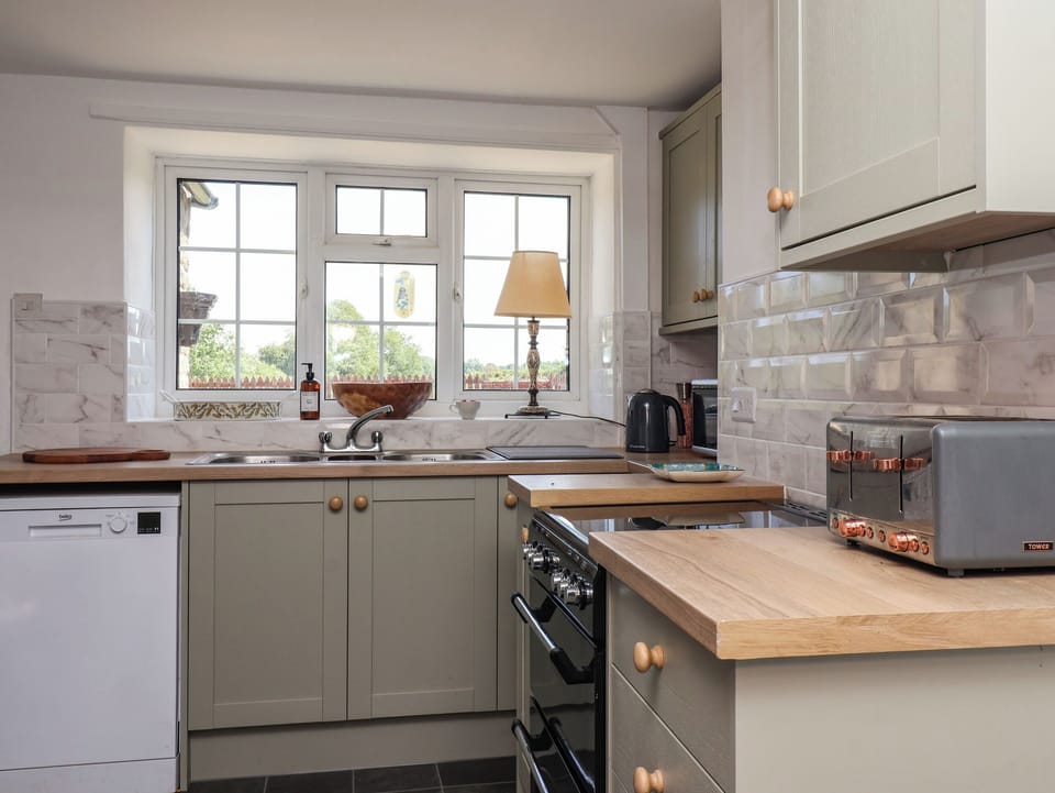 Fridge, microwave, toaster, cookware/dishes/utensils