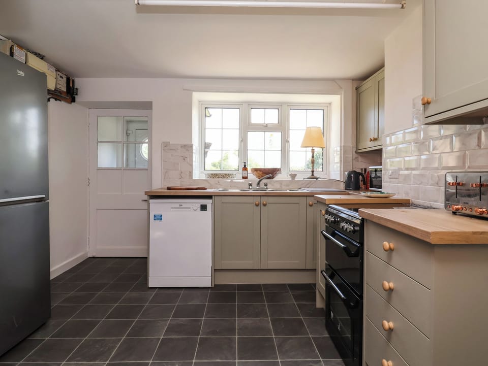 Fridge, microwave, toaster, cookware/dishes/utensils
