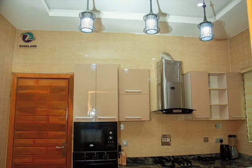 Economy Apartment, Balcony, City View | Private kitchen | Fridge, microwave, oven, stovetop