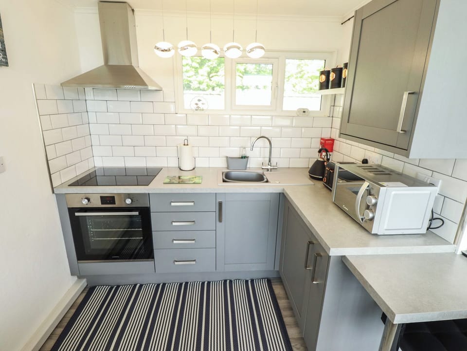 Fridge, microwave, toaster, cookware/dishes/utensils