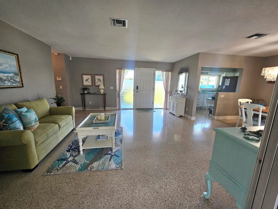 Front entrance, large living/dining room area, kitchen entry