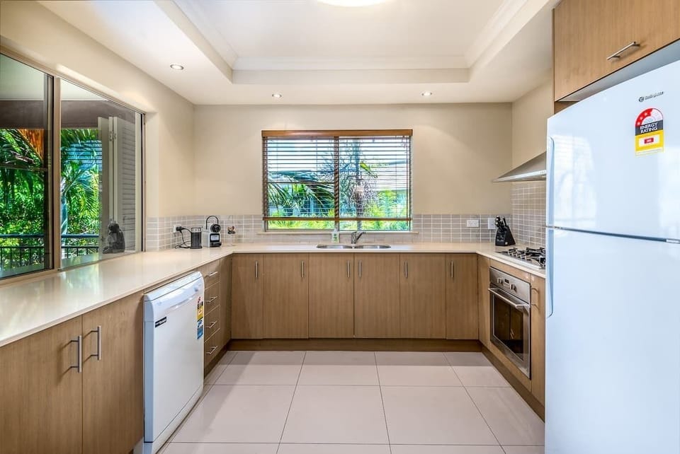 The fully catered kitchen includes a fridge, oven, stove and coffee maker as well as a dishwasher for easy cleanup. 
