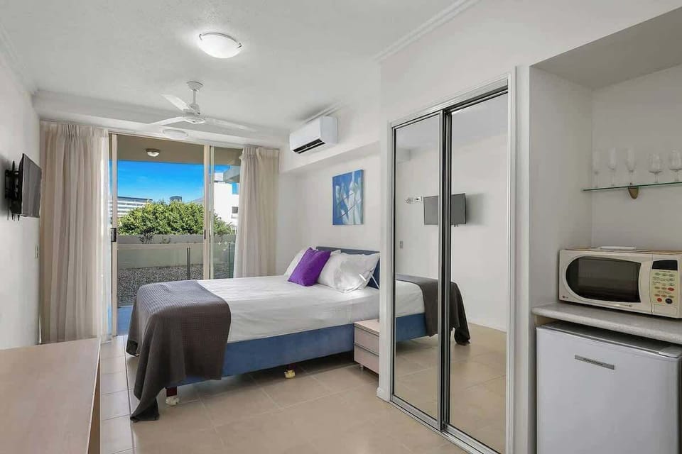 The second bedroom features a comfortable queen-sized bed, private patio, kitchenette and ensuite bathroom.