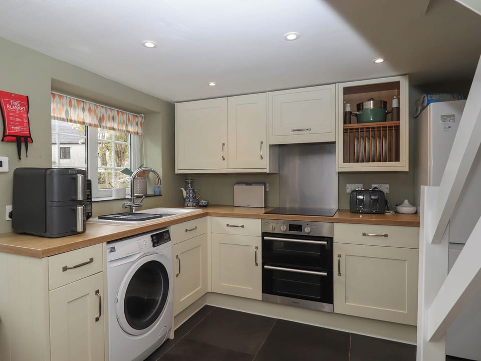 Fridge, toaster, cookware/dishes/utensils