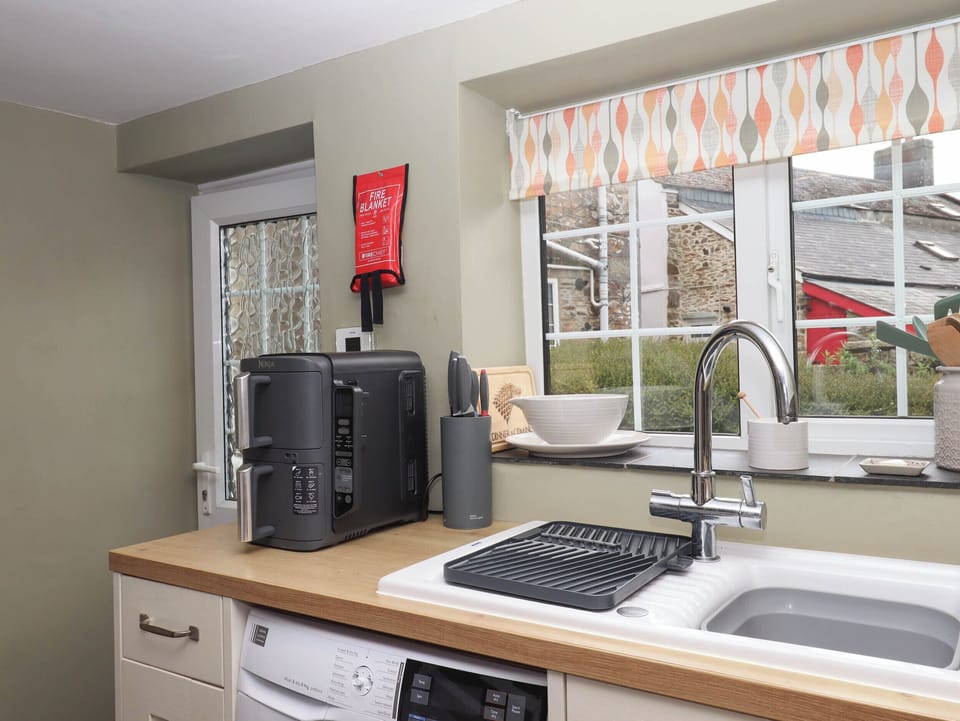 Fridge, toaster, cookware/dishes/utensils